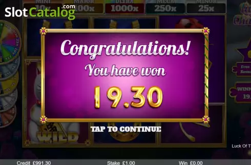 Win Free Spins screen. Luck of the Charms slot